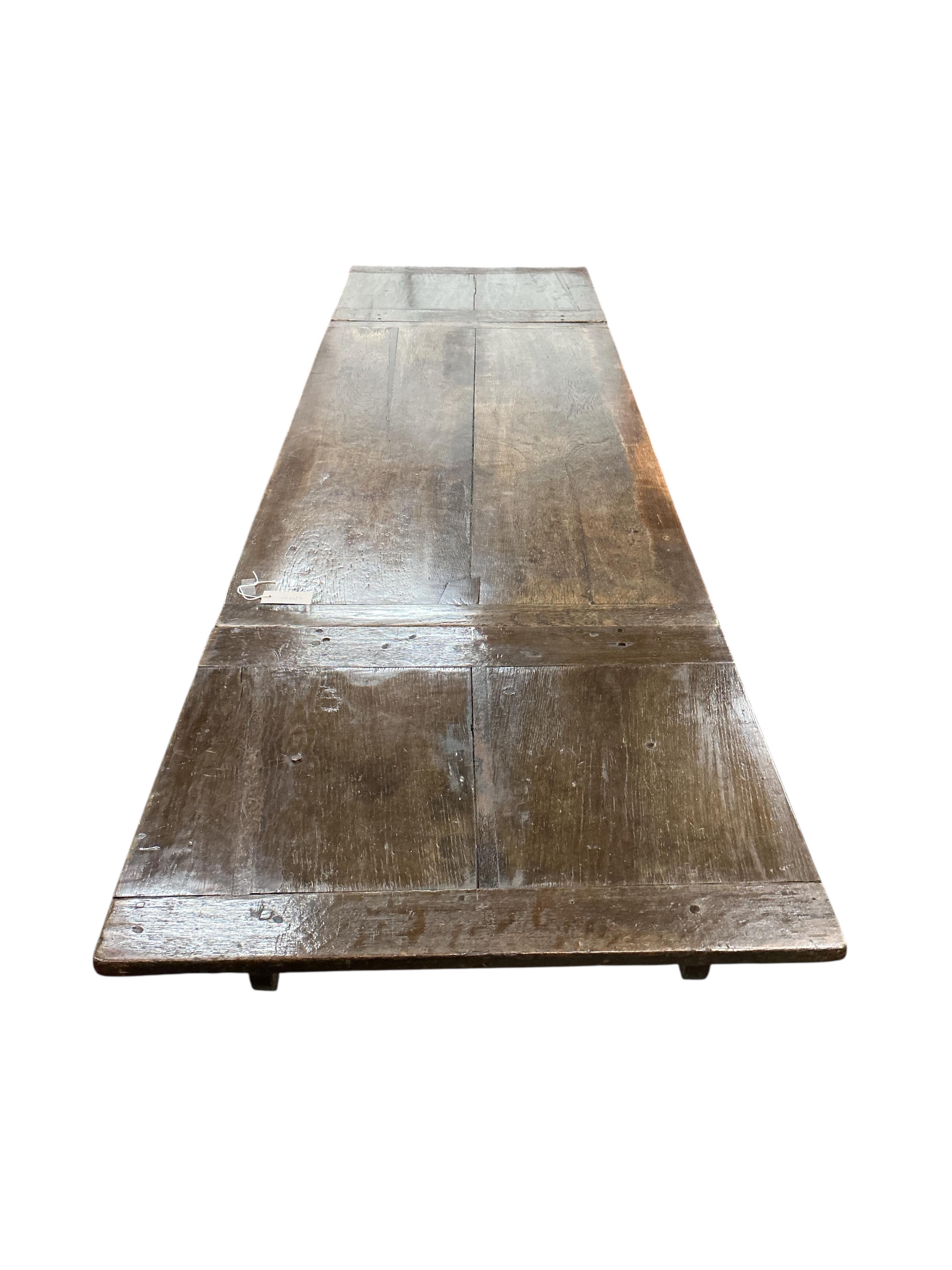 A small 18th century and later rectangular oak draw leaf refectory dining table, width 258cm extended, depth 70cm, height 75cm